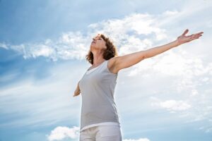 Breathing,Outside,-,Zen,Middle,Aged,Yoga,Woman,Opening,Up