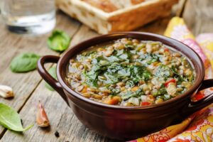 Lentil,Spinach,Soup,On,A,Dark,Wood,Background.,The,Toning.