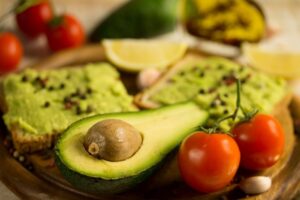 Halved,Avocado,And,Avocado,Sandwich,On,A,Cutting,Board
