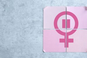 Four,Pink,Cards,Arranged,To,Form,A,Menopause,Symbol,Over