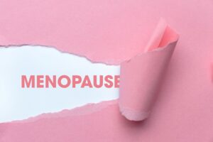 Pink,Torn,Paper,Revealing,The,Word,Menopause