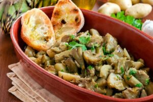 Dish,Of,Delicious,Artichoke,And,Potato,Stew,,Vegetarian,Food Dish,Of,Delicious,Artichoke,And,Potato,Stew,,Vegetarian,Food