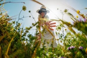 Summer,Mood.,A,Girl,Touches,Flowers,While,Walking,Through,A Summer,Mood.,A,Girl,Touches,Flowers,While,Walking,Through,A